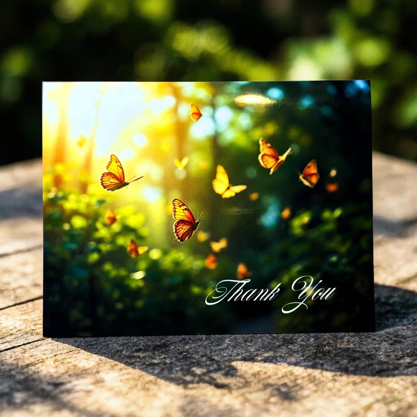 Butterfly card with 'Thank You' text on a natural background