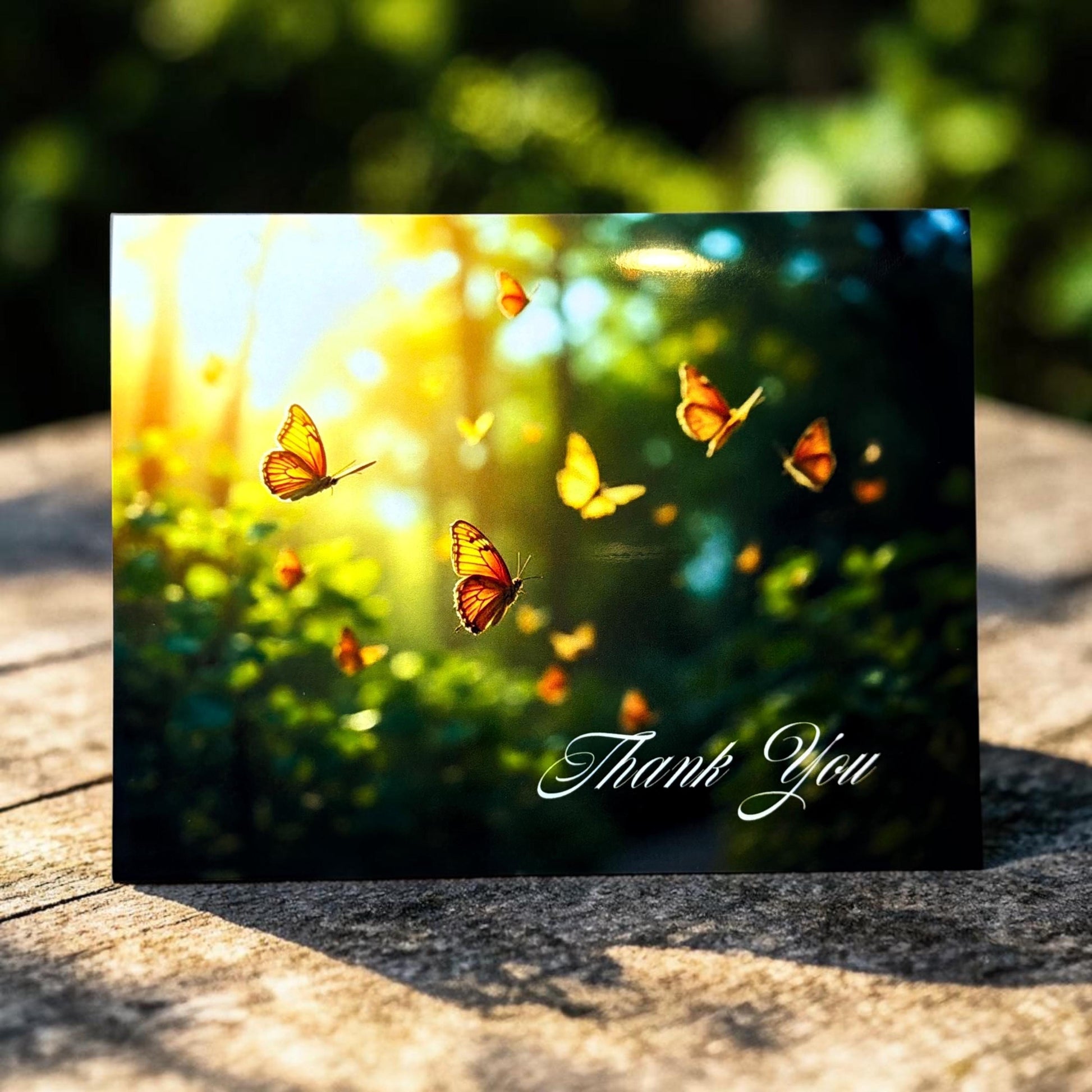 Butterfly card with 'Thank You' text on a natural background